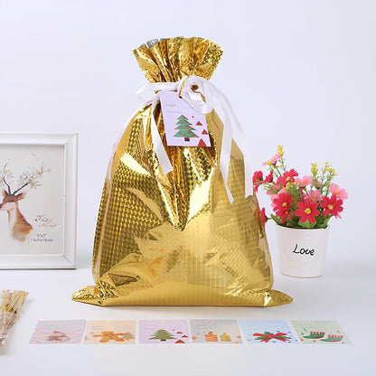 Christmas gift bag with drawstring closure in laser gold finish, 32x24cm dimensions