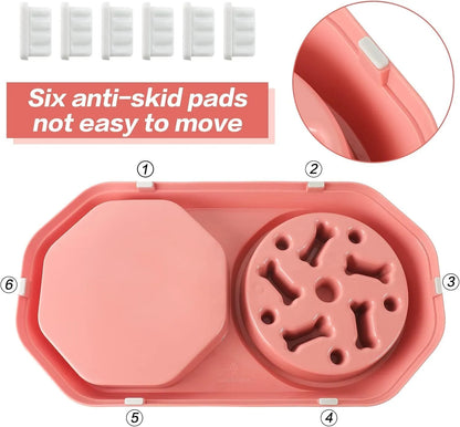 Blue interactive slow feeder dog bowl with maze pattern and non-slip base on a kitchen floor.