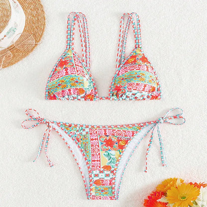 Women's lace-up front split design swimsuit bikini set in polyester with spandex lining.