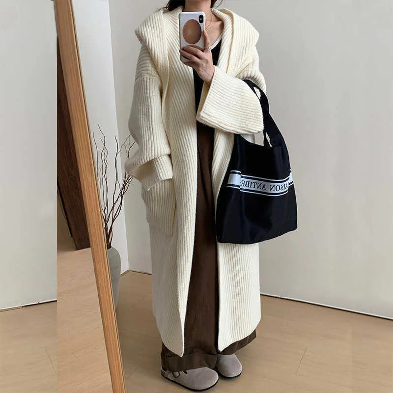 Loose hooded women's cardigan with raglan sleeves in milky white colour showing extended 80cm length