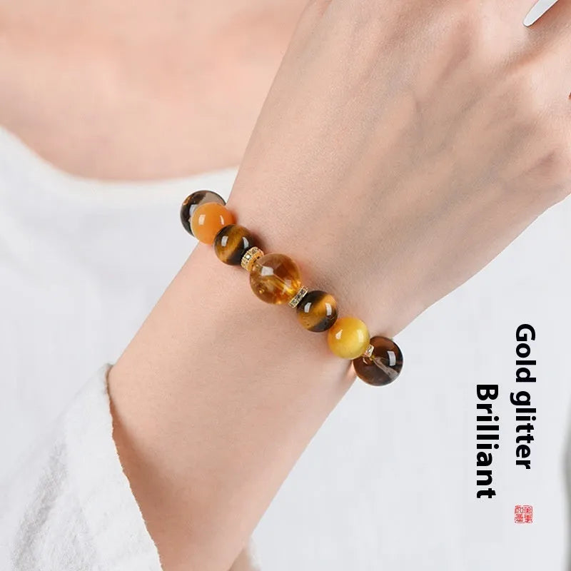 Close-up of a natural yellow 10mm artificial crystal bead bracelet for unisex wear.