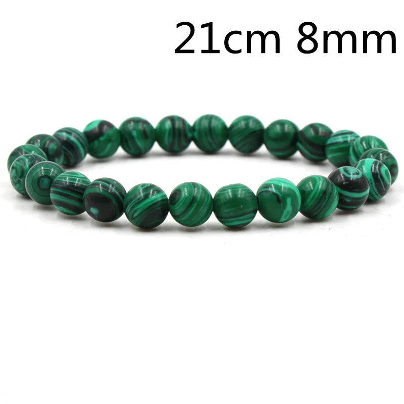 Elegant malachite stone bracelets with unique textures and patterns, perfect for a stylish accessory.
