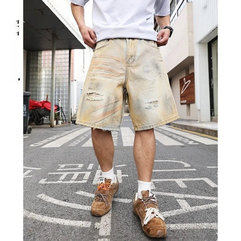 Men's light blue ripped denim shorts with straight-leg style and mid-waist design