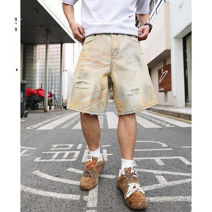 Men's light blue ripped denim shorts with straight-leg style and mid-waist design