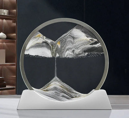 A rotary abstract night lamp with coloured sand falling inside clear glass, showing blue variant.
