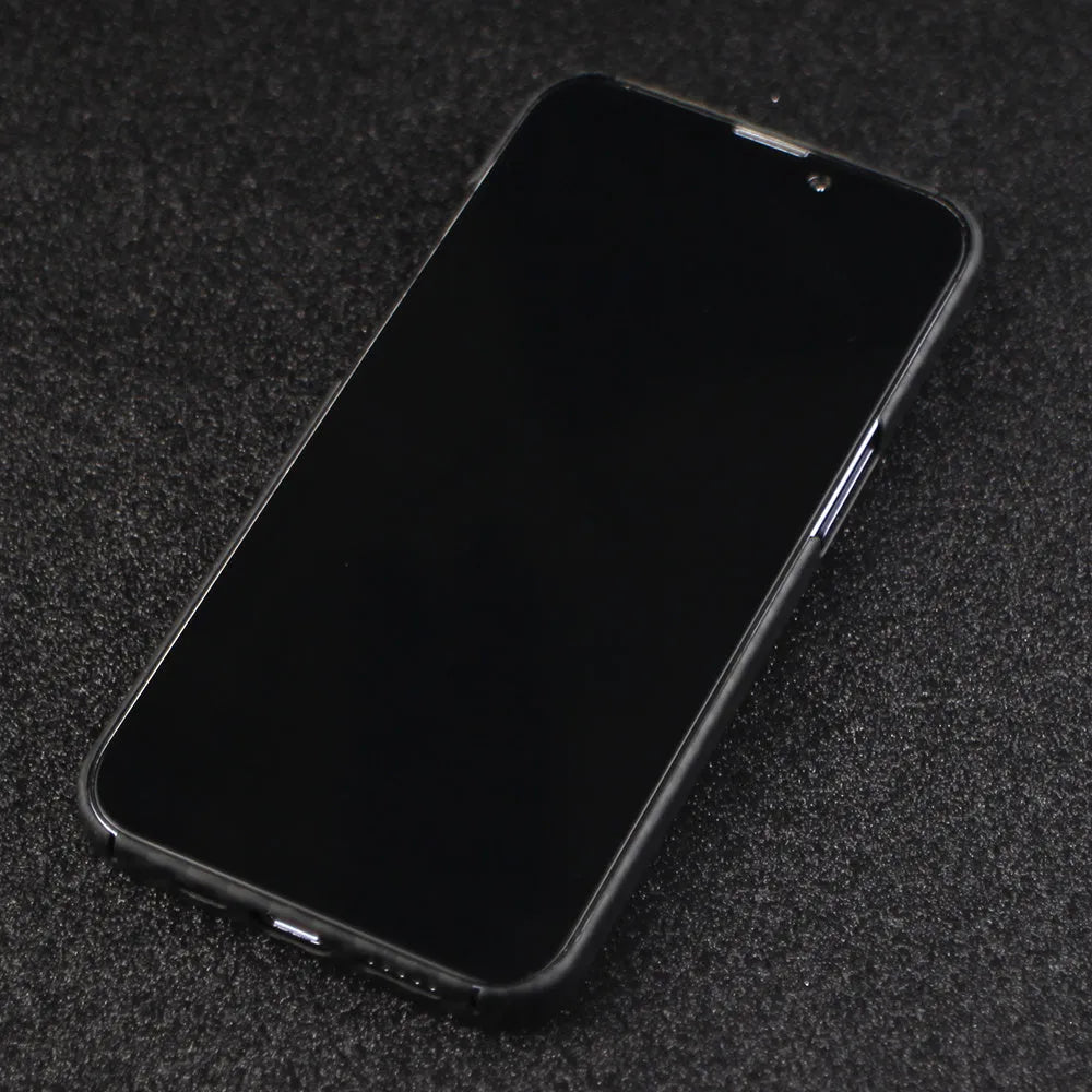 Matte black Kevlar fibre protective case for iPhone showing crater texture and exposed side buttons.