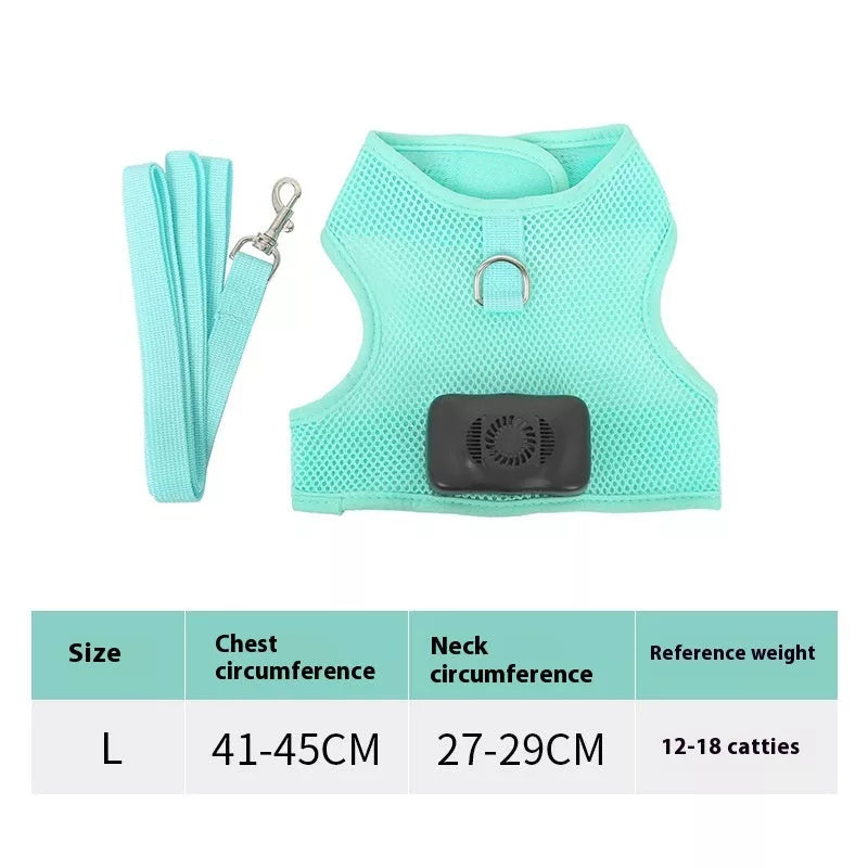 Small dog wearing mint green cooling vest harness with air conditioner