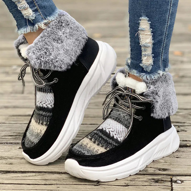 Women's lace-up snow boots in beige with suede upper, thermal fur lining, and non-slip rubber sole on a winter background