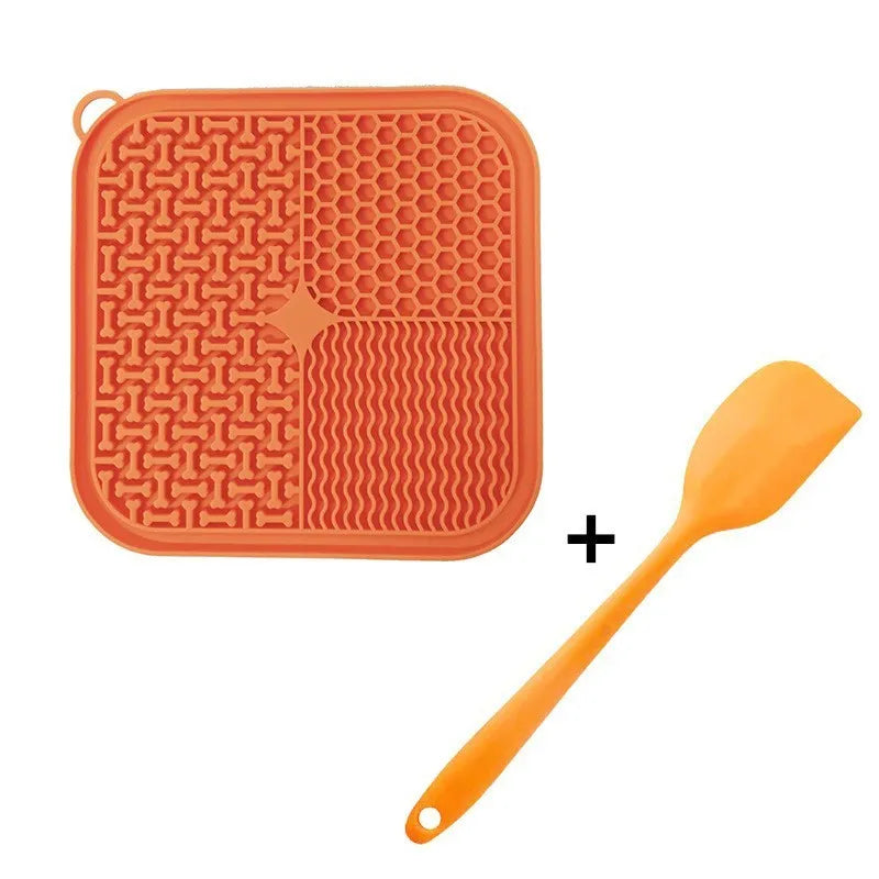 Orange, grey, blue, and green silicone dog licking mat with textured surface and suction cups