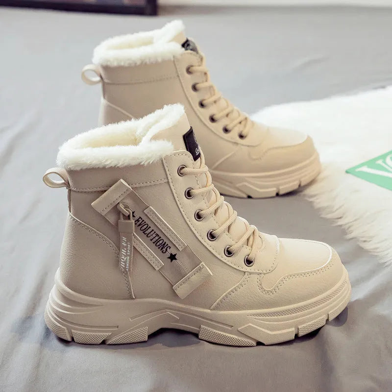Plus size women's fleece-lined snow boot with tall crown, mid-heel, and front lace-up fastening.