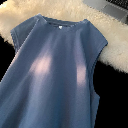 Men's loose solid colour cotton sleeveless tank top on a hanger.
