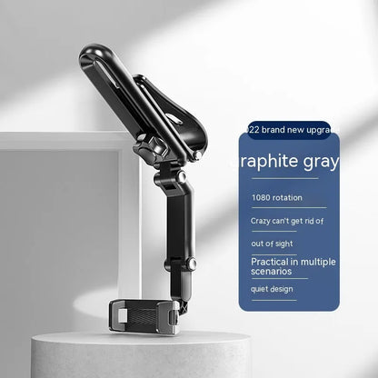 Grey and green car phone bracket with adjustable clip mounted on a car dashboard