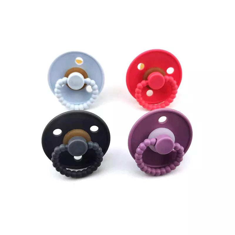 Natural latex pacifier for newborns with breast simulation design in dark gray
