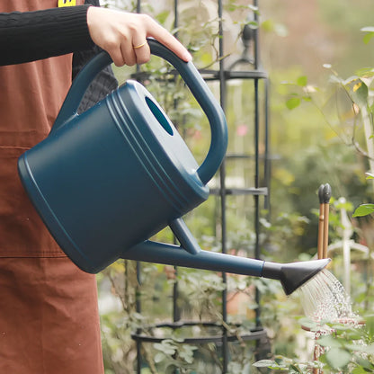Large blue plastic watering kettle with 10-litre capacity and retro design for garden use