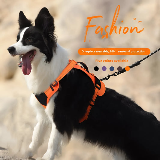 Orange reflective dog harness with attached black hand-holding rope leash shown on a medium-sized dog.