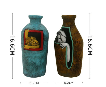 Blue hand-painted abstract resin wall vase measuring 18cm tall with pendant hanging form