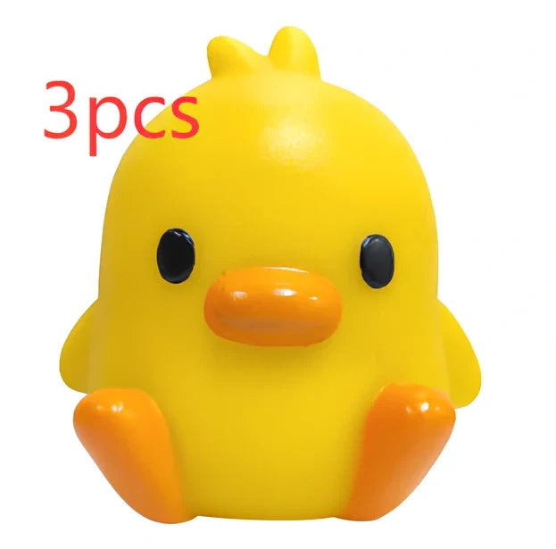 Small yellow duck-shaped night lamp measuring 6cm tall with warm LED light