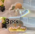 DIY tulip-shaped night lamp kit with LED lights and mirror surface in assorted colours on a desk.