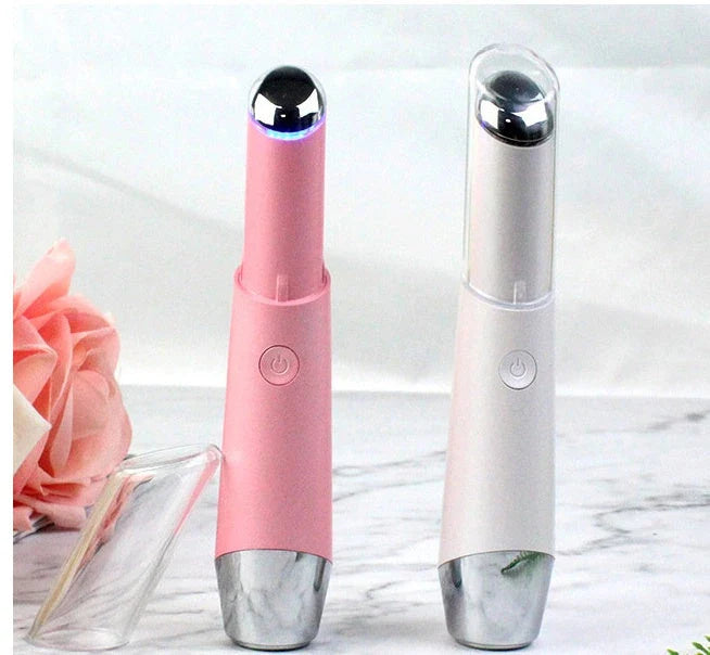 Vibrating eye massager with heat therapy to reduce dark circles and wrinkles