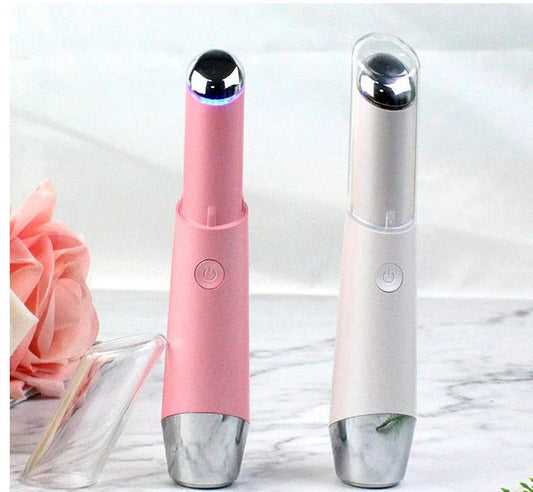 Vibrating eye massager with heat therapy to reduce dark circles and wrinkles