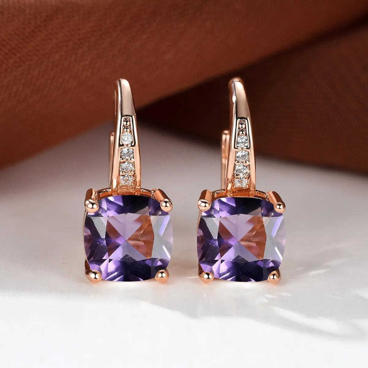 Square zircon inlaid ear hook earrings with geometric design and electroplated finish in golden tone