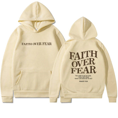 A stylish Christian hoodie with inspirational graphics and a message of faith over fear