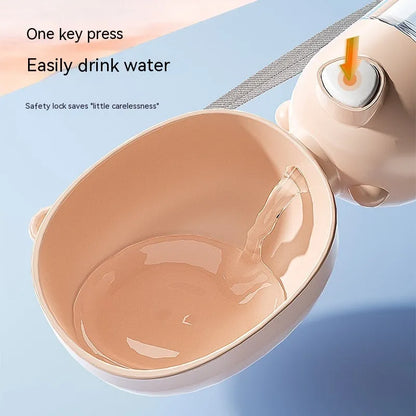 Portable dog water bottle with feeder bowl in brown, pink, or yellow colours for outdoor pet travel