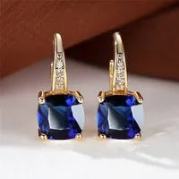Square zircon inlaid ear hook earrings with geometric design and electroplated finish in golden tone