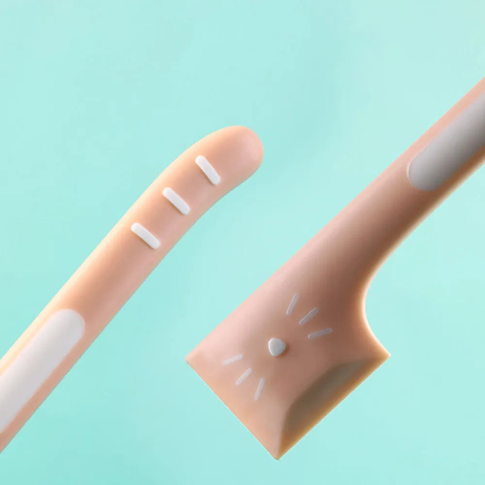 Green long-handled plastic spoon for scooping pet food from a can.