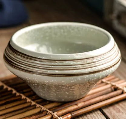 A tall porcelain soup bowl with a Japanese-inspired underglaze pattern, suitable for noodles and microwave use.
