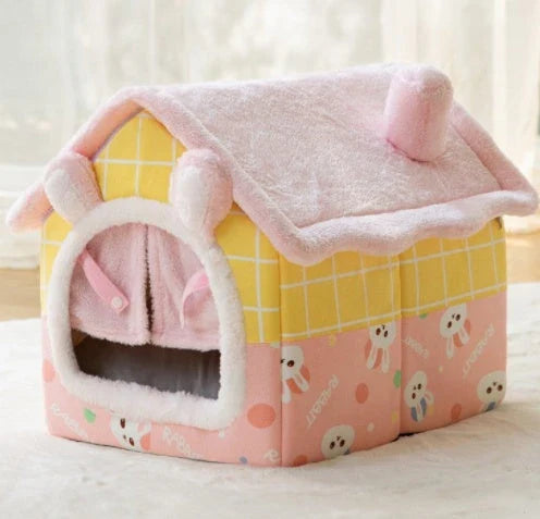 A cozy and comfortable pet bed with a self-warming fabric, durable non-slip base, and removable machine-washable cover