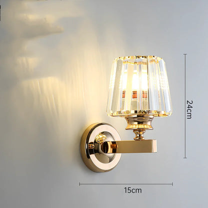 Crystal bedside lamp with stainless steel base and transparent shade providing soft illumination