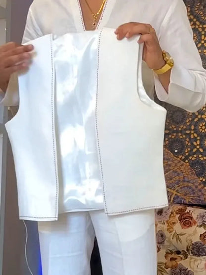 White three-piece polyester outfit showing V-neck shirt, sleeveless vest, and full-length trousers