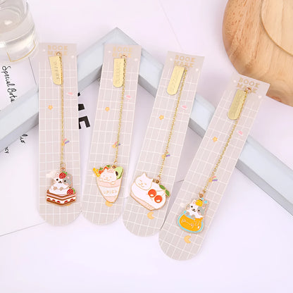 Jane Lime Foodie cat creative metal bookmark with cartoon pendant on a book page.