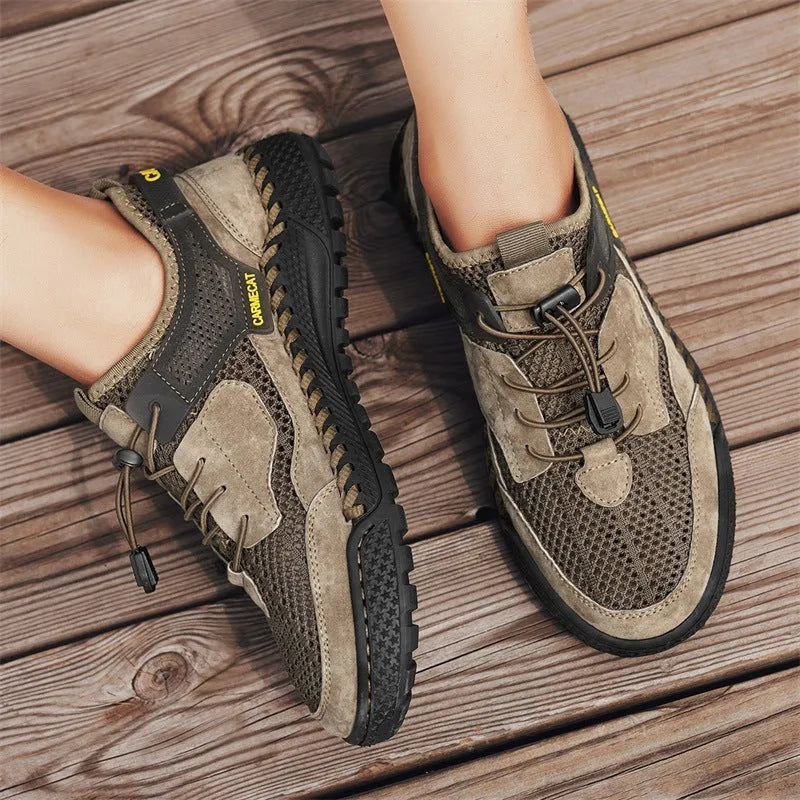 Men's brown suede casual tennis shoes with elastic band closure and hand-stitched rubber sole.