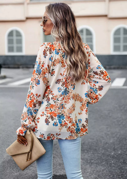 Women's floral print V-neck long sleeve chiffon blouse in black, blue, and apricot