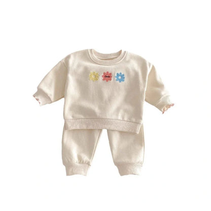 Light beige cotton sweatshirt and sweatpants set with small flower print for girls