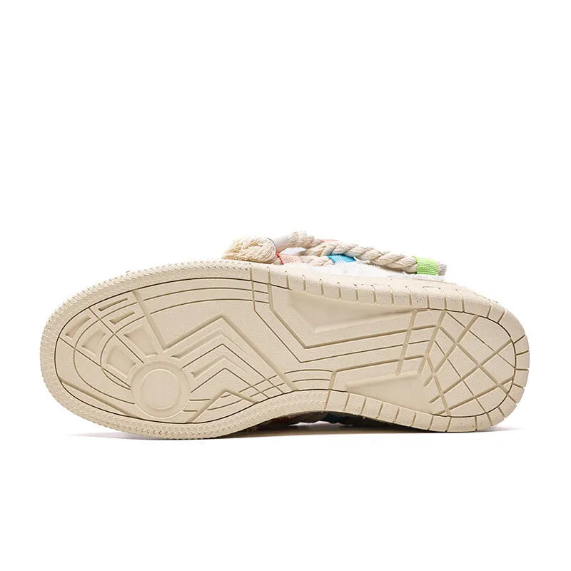 Creamy white old damage retro skate shoes with lace-up front, platform heel, and round toe.