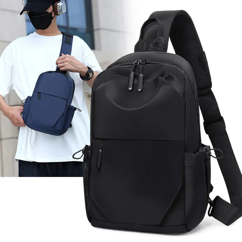 Grey waterproof polyester chest bag with shoulder strap showing 33cm height and 20cm width dimensions