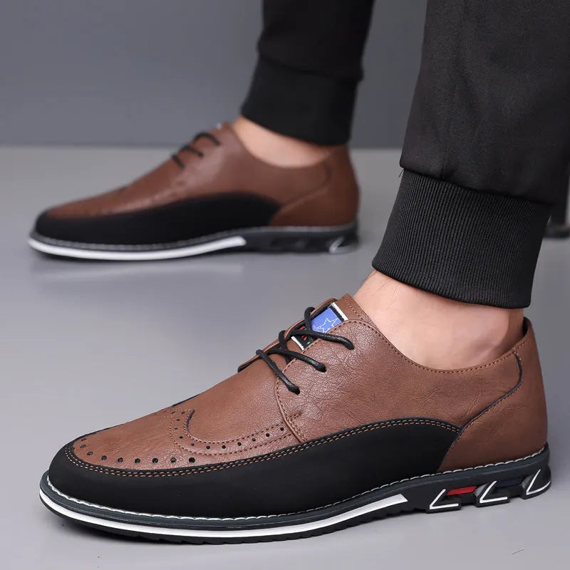 Men's black leather casual shoes with a leather toe cap and rubber sole on a white background.
