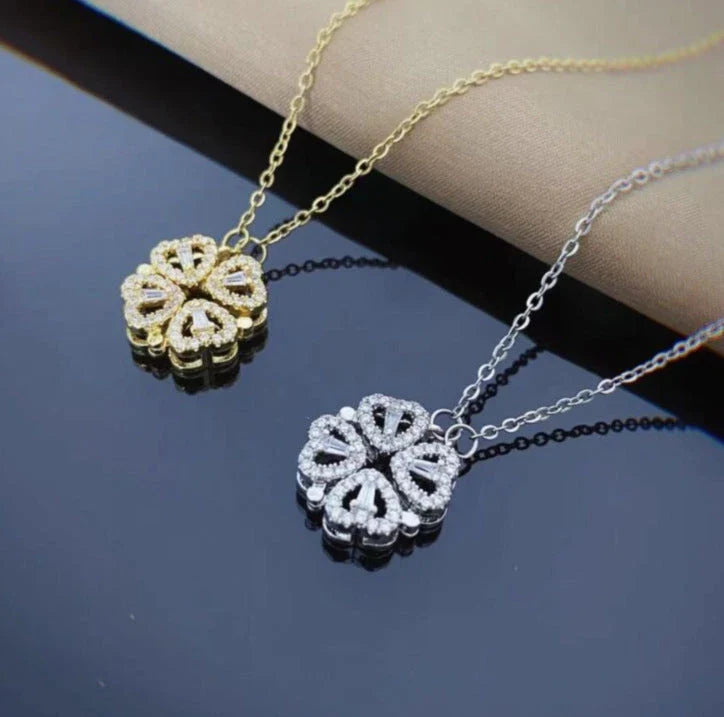 Enchanting magnetic heart-shaped four-leaf clover pendant necklace in gold, silver, and rose gold colors