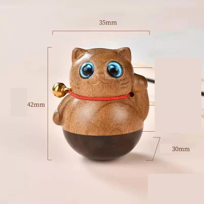 Handmade green sandalwood kitten ornament with unique design