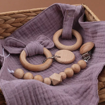 Natural cotton baby bath toy set with wooden rattle and comfort towel