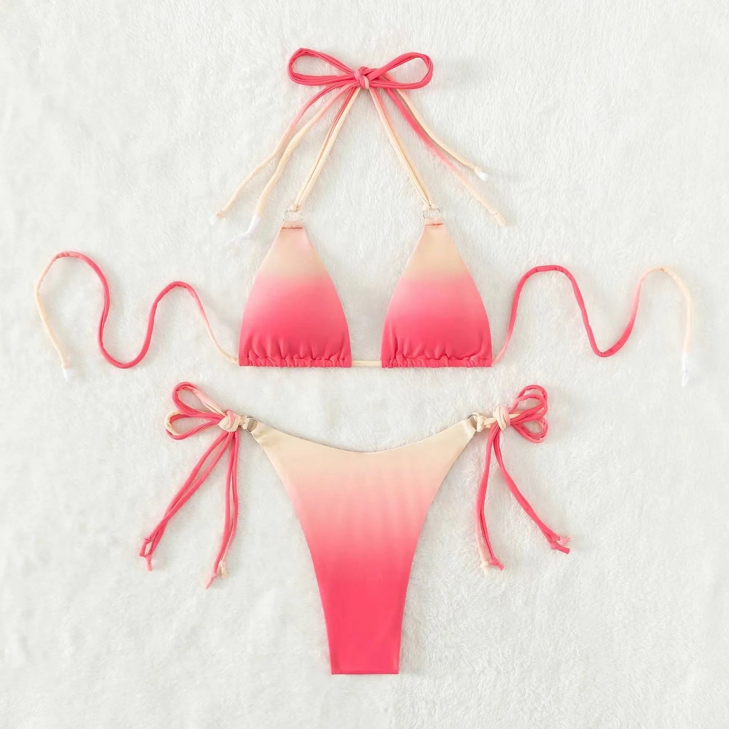 Women's two-piece gradient colour bikini swimwear set on a hanger.