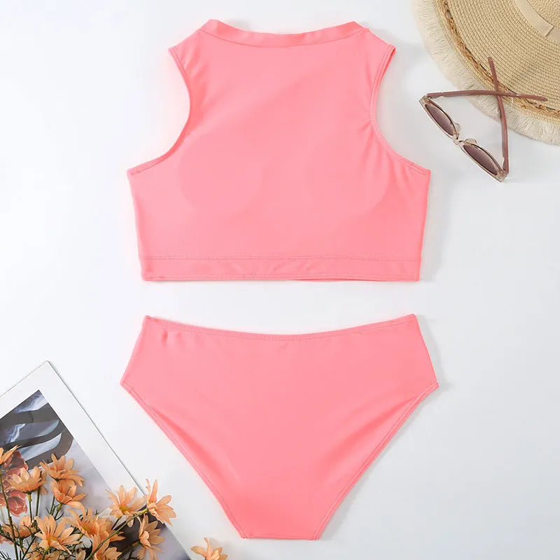 Pink high-waist split bikini swimsuit with briefs style and sleeveless design on mannequin