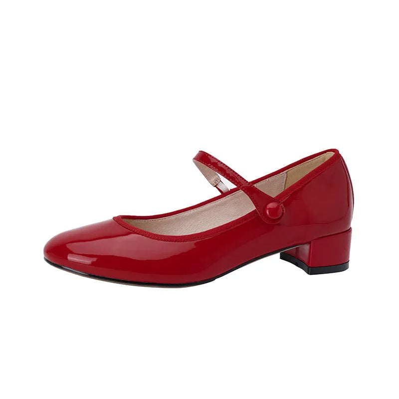 Women's chunky heel retro round head pumps with ankle-strap buckle, two-layer cowhide upper, rubber sole, red or black, sizes 35-39