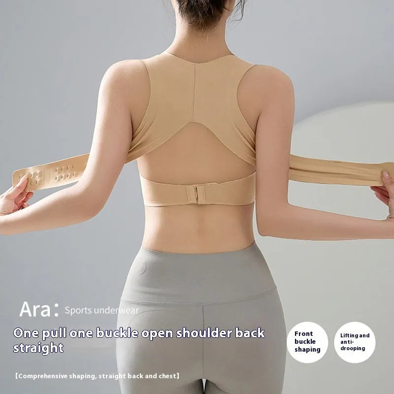 Women's front buckle yoga bra in black, showing back shaping design and fixed double straps.