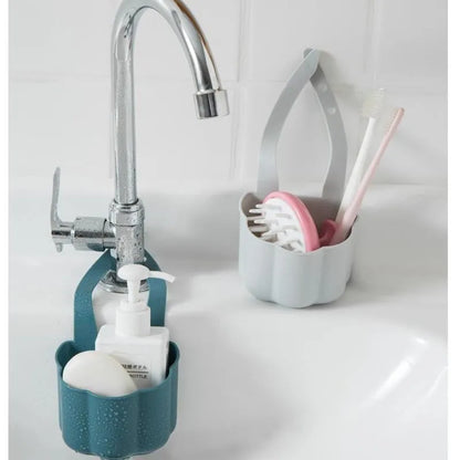 Nordic style plastic sink drain basket with draining compartment in blue, grey, or pink colour options.