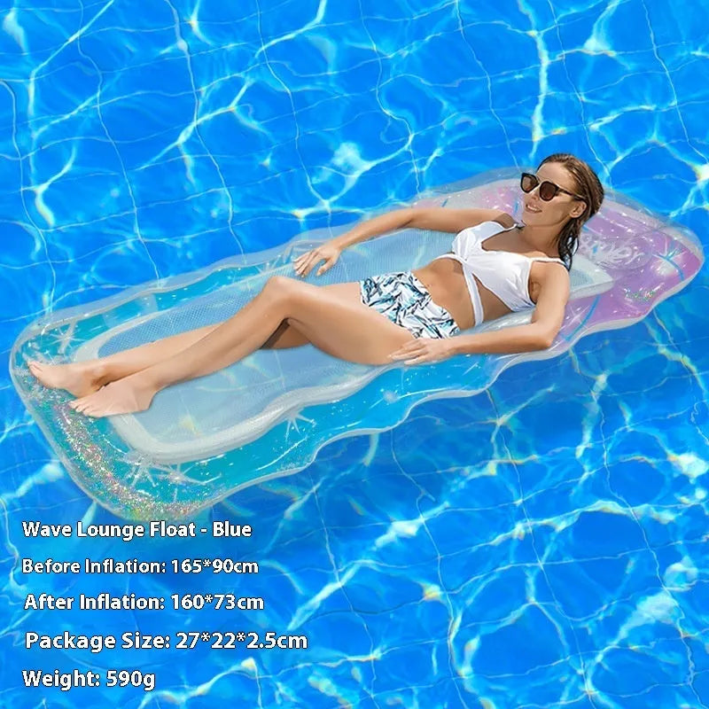 Vibrant gradient blue and purple sequined inflatable pool float lounger on water
