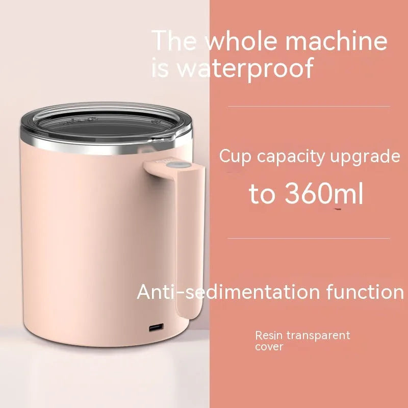 White automatic magnetic stirring coffee cup with stainless steel interior on a desk